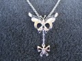 Butterfly and bow necklace 